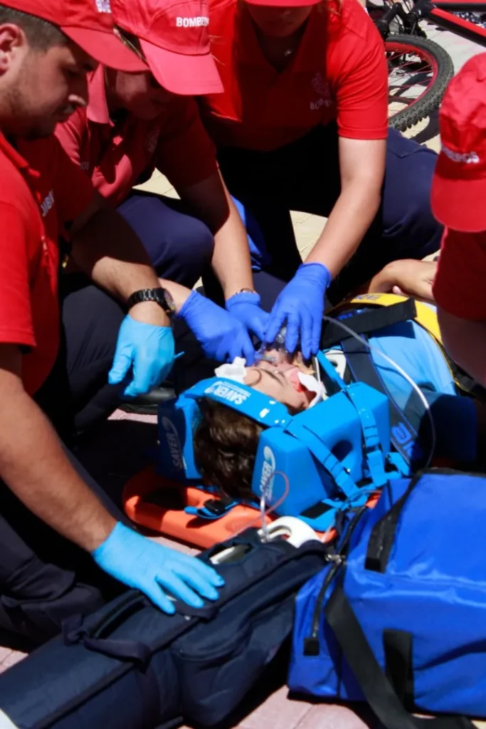 Emergency medical workers treating an injured person